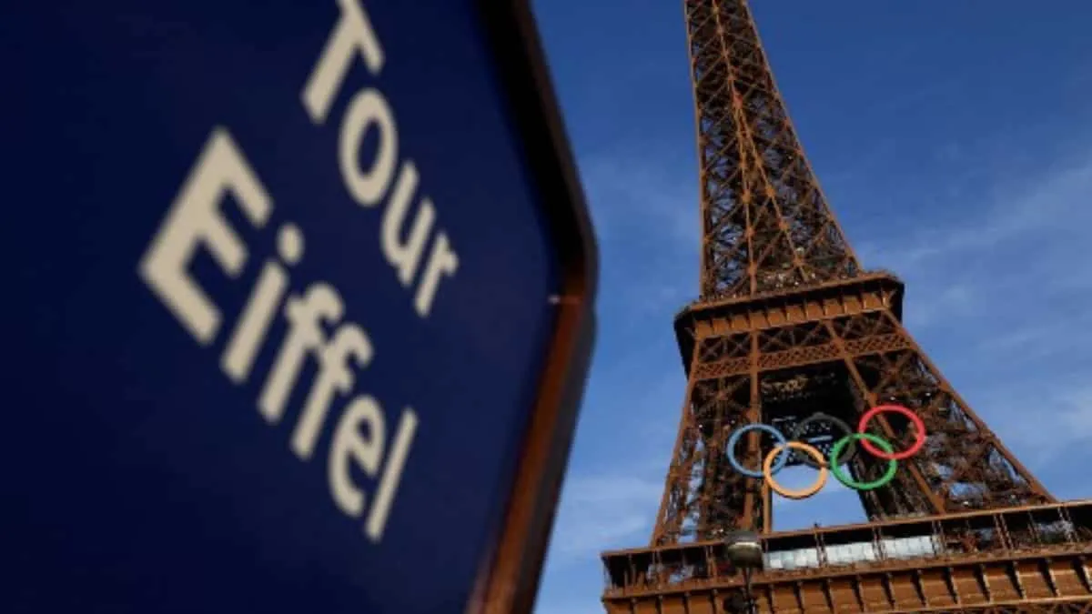 Olympic rings seen on Eiffel Tower | File via AFP
